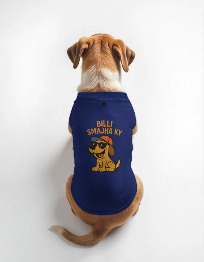 Dog wearing a blue shirt with a cartoon character and text on a white background