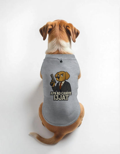 Dog wearing a gray t-shirt with a graphic design on a white background