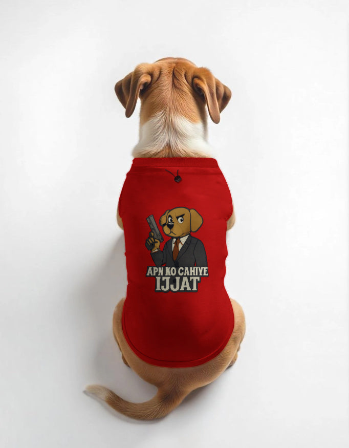 Dog wearing a red shirt with a graphic design on a white background
